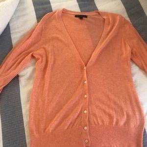 Hardly worn orange v-neck button down cardigan